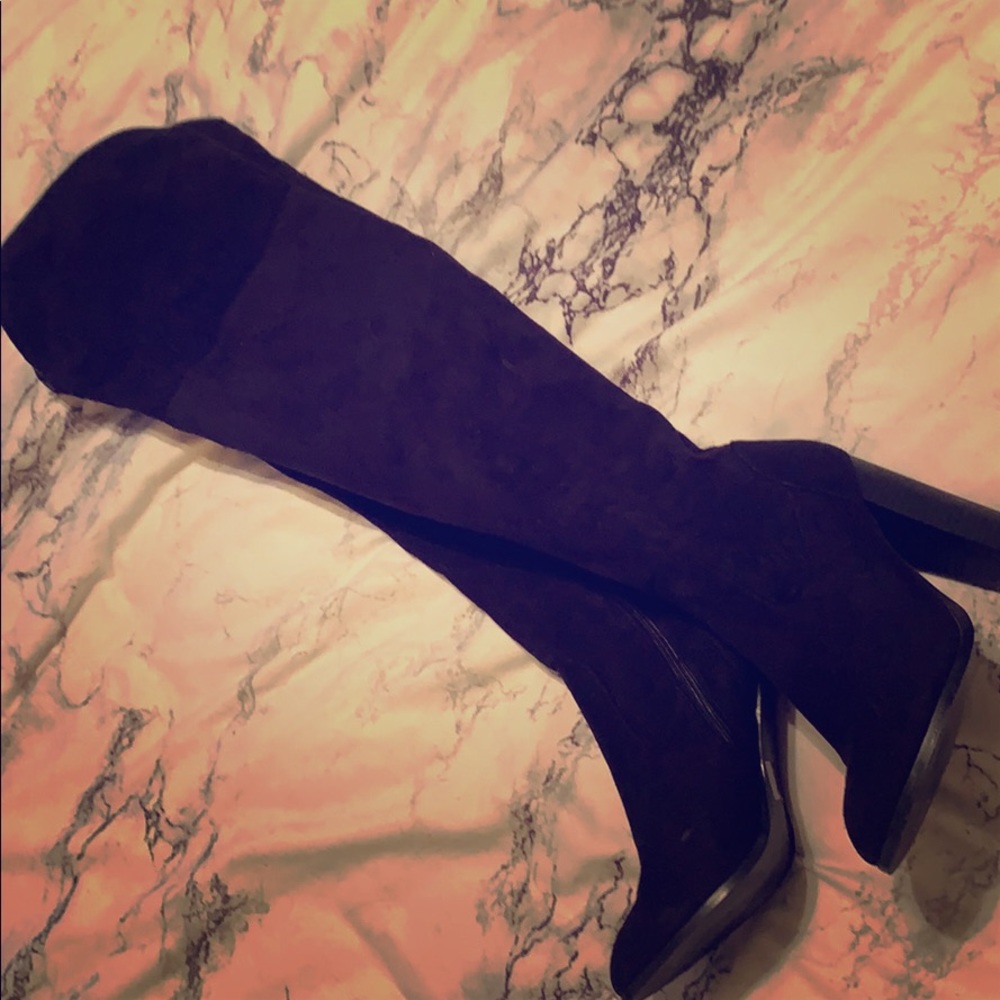 Thigh high black boots